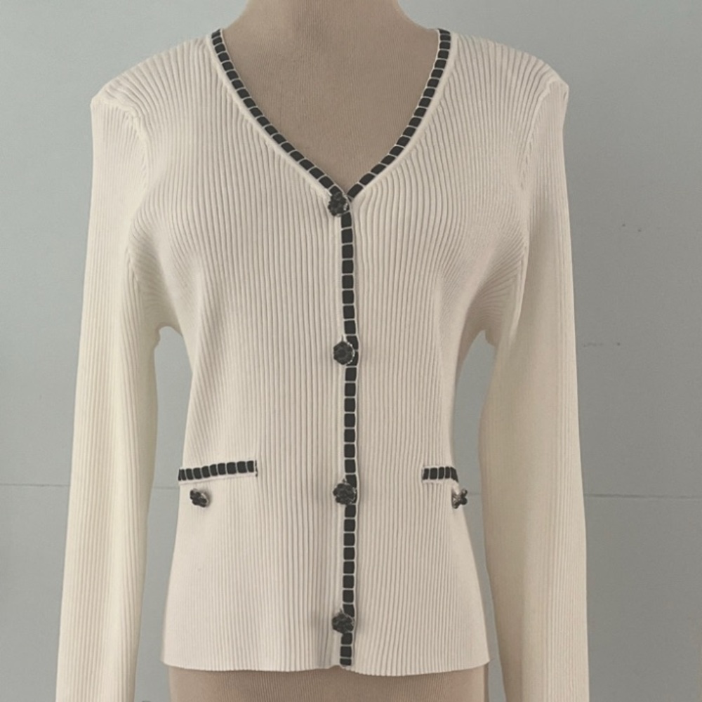 This is a CeCe Women's Ribbed Contrast Stitch Beaded Button Cardigan.